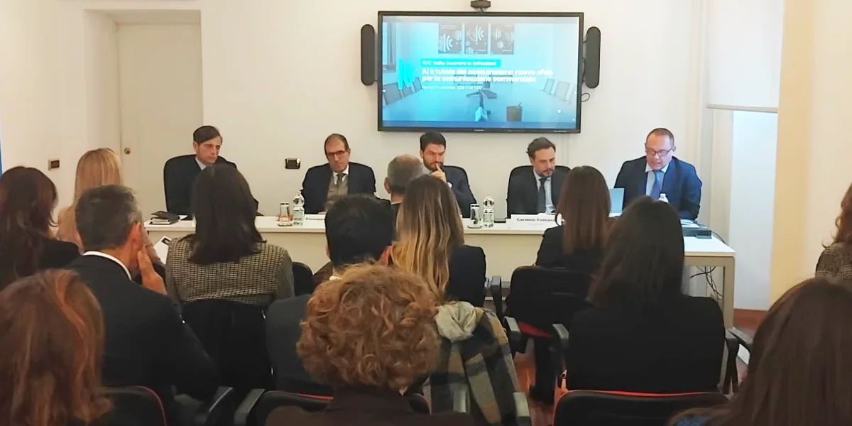 Sala della sede ICC Italia durante l’incontro su AI e tutela del consumatore, con pubblico e tavolo dei relatori.